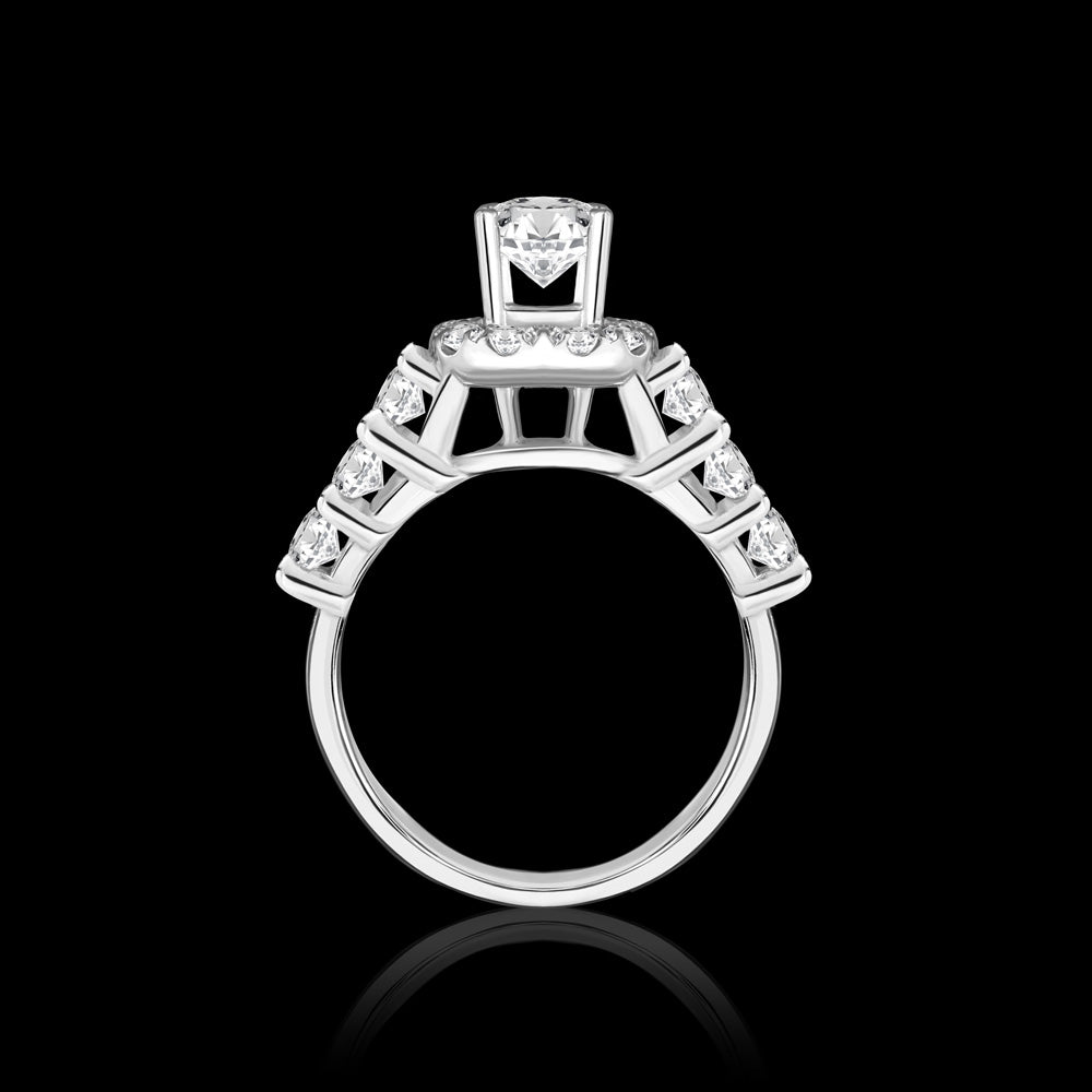A Solitaire ring with a cushion halo, encircling a captivating round center stone, combining classic elegance with a touch of vintage charm Bridal jewelry / IRKI194D