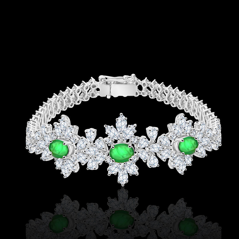 Emerald stones surrounded with round diamonds exuding sophistication and timelessness - NADL-BR