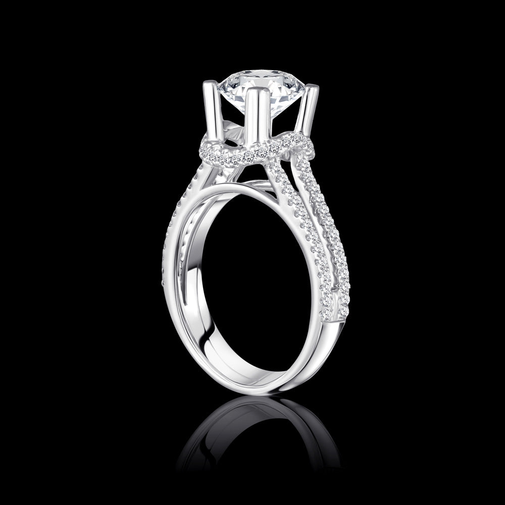 A Solitaire ring elegantly belted with delicate round-shaped stones, adding a touch of refinement to its timeless design Bridal jewelry / SO4488