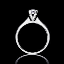 Classic and timeless Plain Solitaire ring, featuring a brilliant round center stone that radiates pure elegance Bridal jewelry / FRK94P/WG
