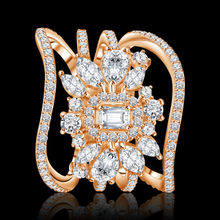 An iconic statement ring featuring a captivating combination of round and emerald stone cuts Statement jewelry / I-R106