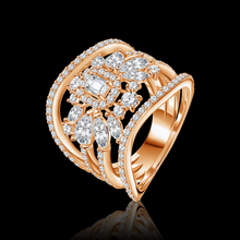 An iconic statement ring featuring a captivating combination of round and emerald stone cuts Statement jewelry / I-R106