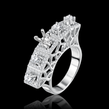 Twin Ring featuring an enchanting, intricately entwined design on full display Bridal jewelry / ITK971