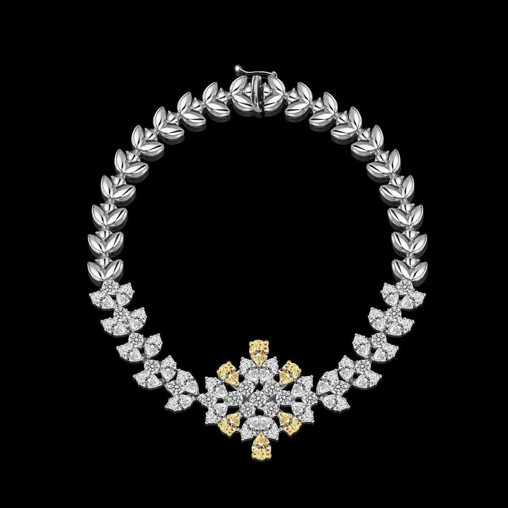 A floral designed bracelet featuring yellow diamonds crafter with perfection - NADL-BR