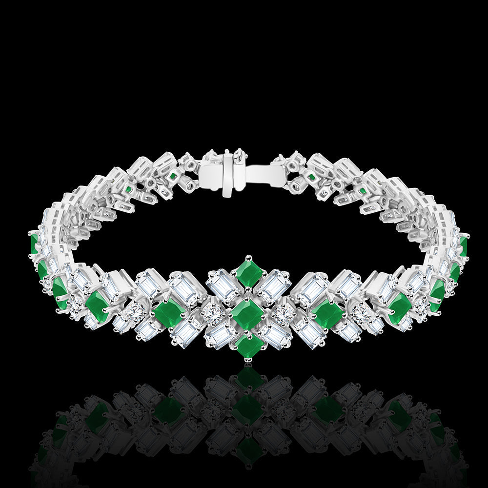 The mesmirizing green hues complimenting Bauguette shaped diamonds for a statement bracelet - NADL-BR